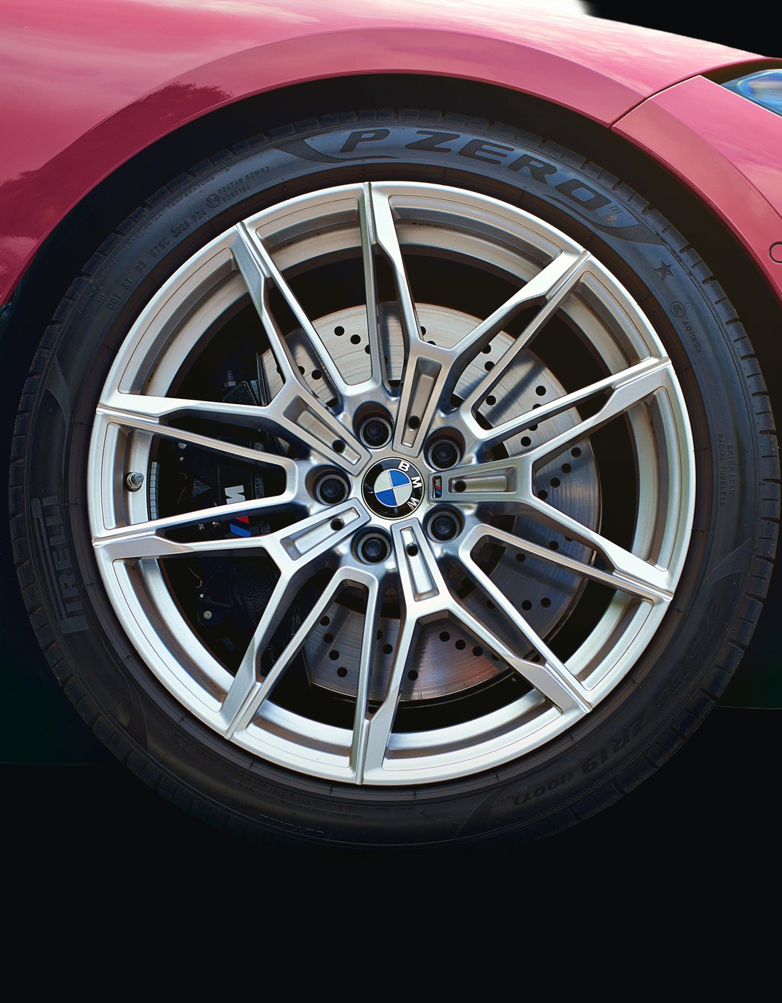 Extreme close-up of a vehicle's alloy wheel